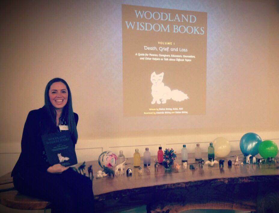 Dallas presenting Woodland Wisdom Books Volume 1 at Abbotsford Hospice Society