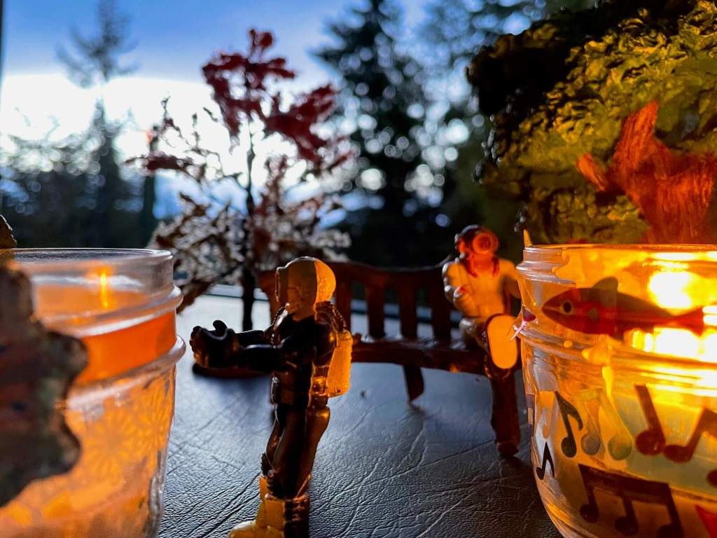 Small toys with snow, fish, and music themed Memory Lanterns